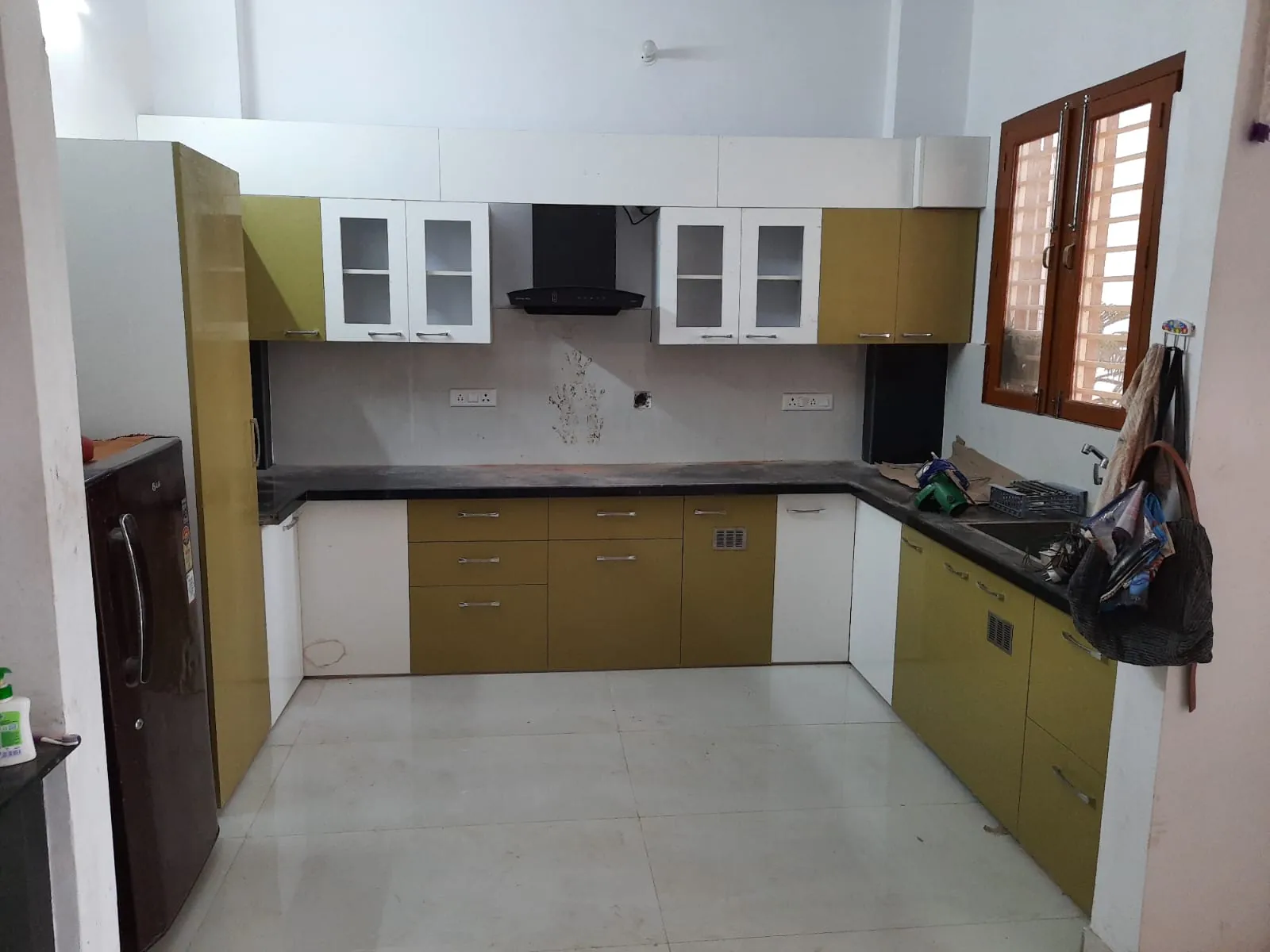 Olive green and white modular kitchen side view Bharatpur